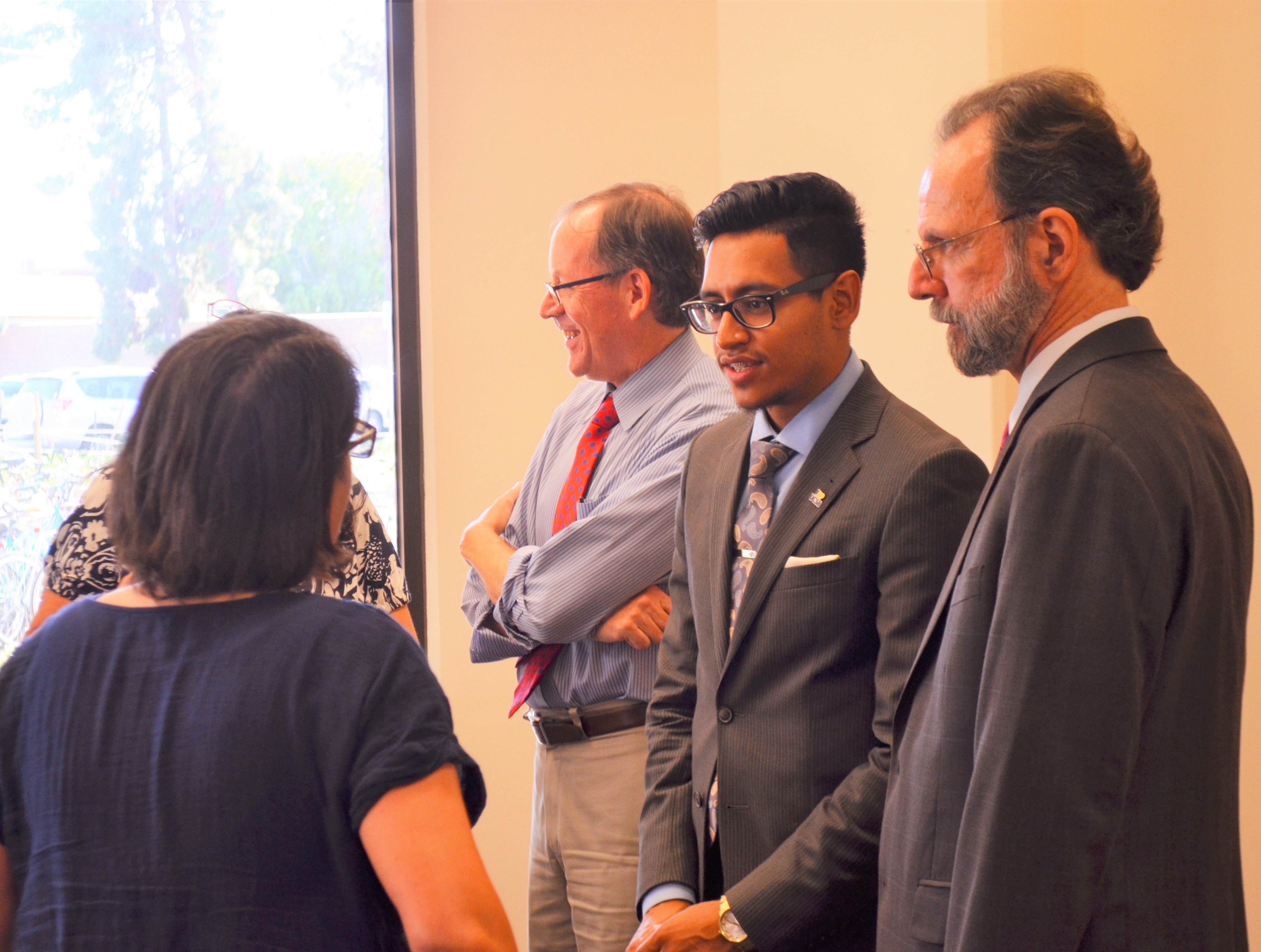 People standing at a welcome